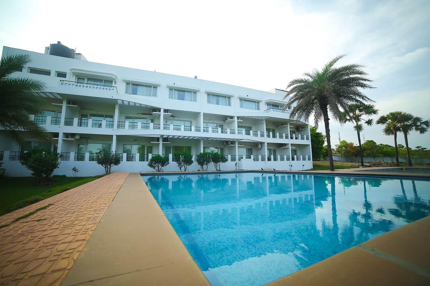Pool with Resort Building